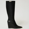 Bottes Montantes Avec Semelle Compensée Et étiquette Siglée