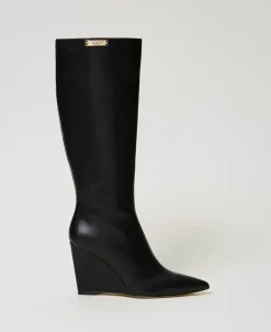 Bottes Montantes Avec Semelle Compensée Et étiquette Siglée