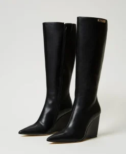 Bottes Montantes Avec Semelle Compensée Et étiquette Siglée