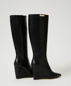 Bottes Montantes Avec Semelle Compensée Et étiquette Siglée
