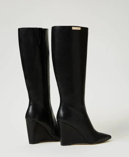 Bottes Montantes Avec Semelle Compensée Et étiquette Siglée