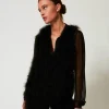 Gilet Avec Plumes
